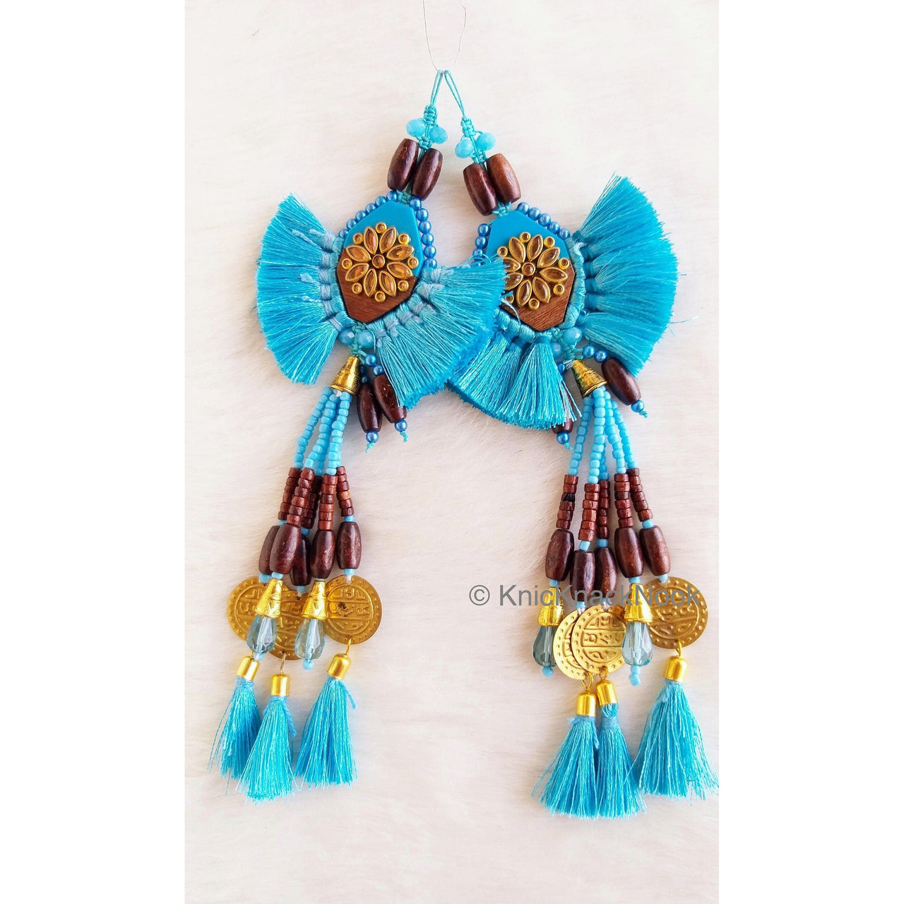 Cyan Blue Tassels With Blue Acrylic And Brown Wood Button In Kundan Stones, Wood Beads, Pearls