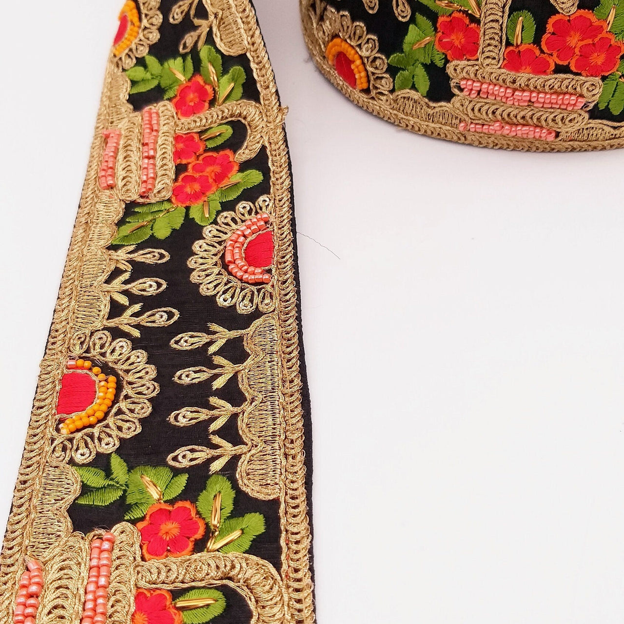 Black Art Silk Fabric Trim With Green, Orange, Red And Gold Floral Emb ...